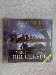YENİ BİR ÜLKEDE FİLM , VCD , -