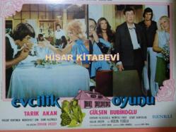 Efemera - EVCİLİK OYUNU TARIK AKAN FİLM LOBİ 1 - kitantik - kitaLog