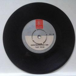 Yıldız Tezcan - Çek elini ellerimden / Sarayburnu'nda aşk / 45'lik