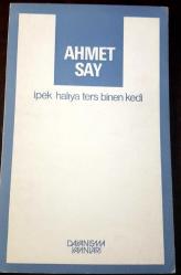 İpek Halıya Ters Binen Kedi