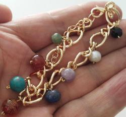 ORTA DÖNEM MÜTHİŞ İŞÇİLİKLİ ORİJİNAL ŞİFALI DEĞİŞİK TAŞLI BİLEKLİK ŞŞ1AA2