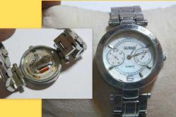 S12-----GUESS ÇELİK KASA KADIN KASA SAATİ-  PİLİ BİTİK OLABİLİR,ÇALIŞMIYOR.