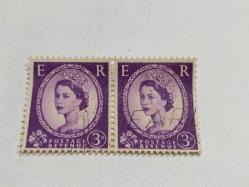 P,5-8-8--1955-İKİ ADET DAMGALI İNGİLTERE KRALİÇE ELİZABETH POSTA PULU