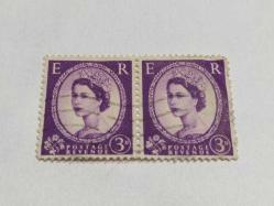 P,5-8-8--1955-İKİ ADET DAMGALI İNGİLTERE KRALİÇE ELİZABETH POSTA PULU