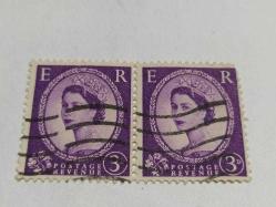 P,5-8-8--1955-İKİ ADET DAMGALI İNGİLTERE KRALİÇE ELİZABETH POSTA PULU