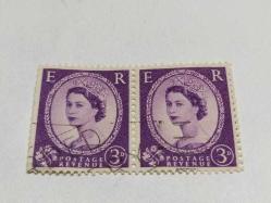 P,5-8-7--1955-İKİ ADET DAMGALI İNGİLTERE KRALİÇE ELİZABETH POSTA PULU