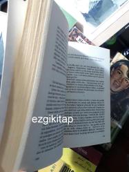 bir sarışın küçük kız - zerrin özer  (imzalı)