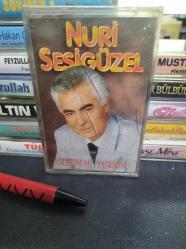 NURİ SESİGÜZEL - ÖLEYİM Mİ YASEMİN - AMBALAJLI - KASET