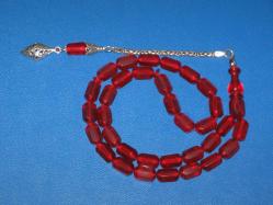 **(58)**TANELERİ ALTI KÖŞELİ EŞSİZ BİR ATEŞİ RENK SIKMA KEHRİBAR