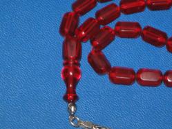 **(58)**TANELERİ ALTI KÖŞELİ EŞSİZ BİR ATEŞİ RENK SIKMA KEHRİBAR