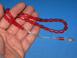 **(58)**TANELERİ ALTI KÖŞELİ EŞSİZ BİR ATEŞİ RENK SIKMA KEHRİBAR