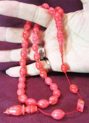 TaTLı NAR ÇİÇEĞİ SıKMa KEHRİBAR 33 Lük TESBİH..8x11mm OSMAN TURAN İmZaLı