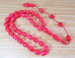 TaTLı NAR ÇİÇEĞİ SıKMa KEHRİBAR 33 Lük TESBİH..8x11mm OSMAN TURAN İmZaLı