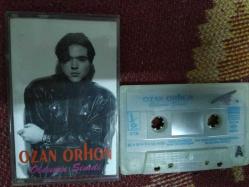 OZAN ORHON OLDU MU ŞİMDİ CAM BASKI