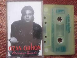 OZAN ORHON OLDUMU ŞİMDİ CAM BASKI