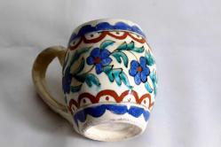 Kütahya porselen el boyaması antika kulplu kupa. Ağız çapı:6cm. Y.9 cm.