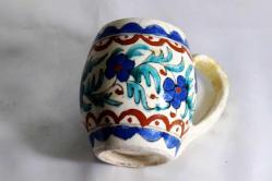 Kütahya porselen el boyaması antika kulplu kupa. Ağız çapı:6cm. Y.9 cm.