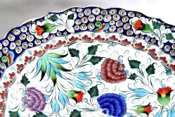 Kütahya porselen el boyaması derin duvar tabağı. İmzalı. Ç:33cm.