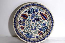 Kütahya porselen el boyaması duvar tabağı. İmzalı. Ç:30cm.