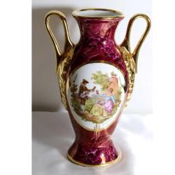 Limoges imzalı el boyaması porselen çift kulplu vazo. Taban çapı 6,5cm. Y 24cm.