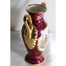 Limoges imzalı el boyaması porselen çift kulplu vazo. Taban çapı 6,5cm. Y 24cm.