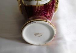 Limoges imzalı el boyaması porselen çift kulplu vazo. Taban çapı 6,5cm. Y 24cm.
