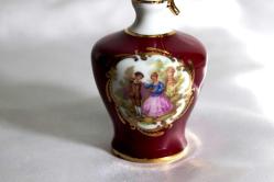 Limoges imzalı el boyaması porselen minyatür kulplu vazo. Y 12,5cm.