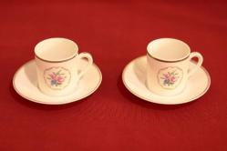 İmzalı ve imalat damgalı, gül motifli, el boyaması Alman çift porselen kahve fincanı. Y:6 cm.