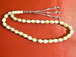 Gümüş püsküllü 33'lük sedef taşlı tesbih. Püskül dahil 30cm.