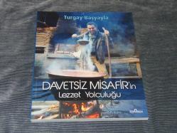 DAVETSİZ MİSAFİR'İN LEZZET YOLCULUĞU-TURGAY BAŞYAYLA-YEDİVEREN YAYINLARI-2013-1.BASKI SIFIR KİTAP