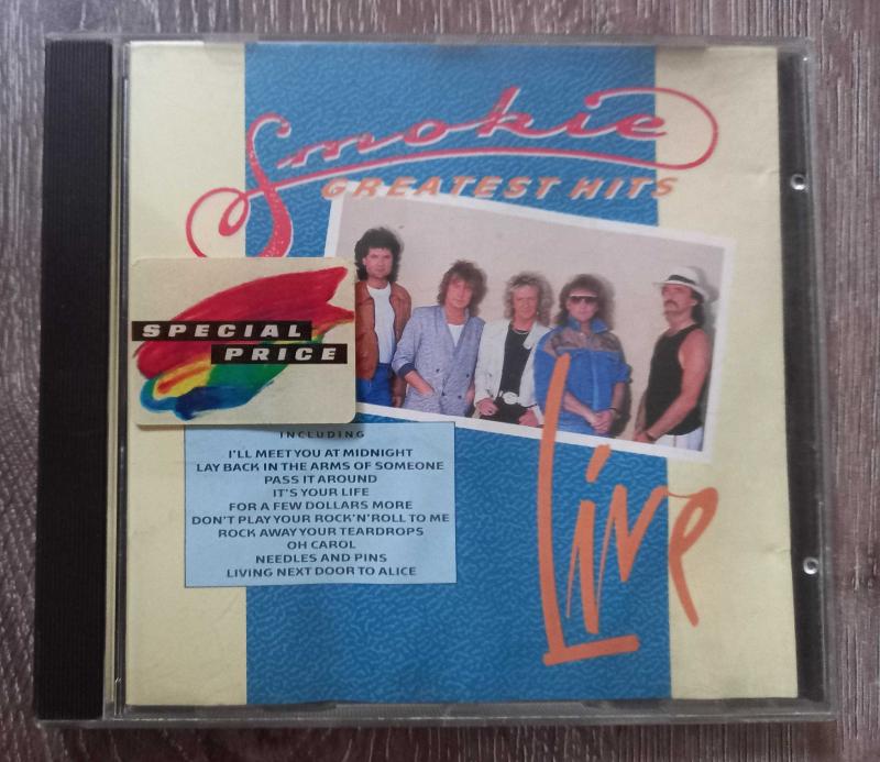 Smokie lay back in the arms. Smokie lay back in the arms