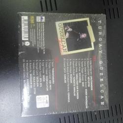 TURGAY GÜZELCAN TÜRKÜLERİ 2 CD ÇEŞİTLİ SANATÇILAR  EDİP AKBAYRAM SUAVİ MAZLUM ÇİMEN VS SIFIR
