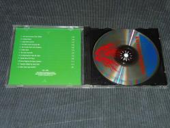 CENGİZ ÖZKAN-KIRMIZI BUĞDAY-SIFIR AYARINDA DÖNEM BASKI MÜZİK CD'Sİ