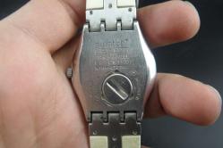 SWATCH AG 2006   MARKA KOL SAATİ DETAYLAR ACIKLAMADA (DEMİR RAF 32 kutu