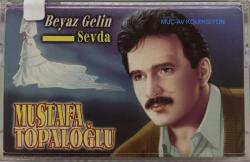 Mustafa Topaloğlu Beyaz Gelin Kaseti, Şeyda, Hep Tersine Tersine, Ben Banamı Yanam Sanamı Yanam, Ha Uzaktan Kumanda, Beyaz Gelin, O Zaman Eyvah, Kendimi Vuracağım, Çok dolaşma, Hayvanlar Bizden Rahat, Kurban Olduğum