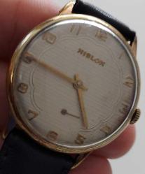 İSVİÇRE HİSLON MARKA ORİJİNAL AKTİF KURMALI HARİKA BAKIMLI ANTİK SARI AKSAMLAR ALTIN KAPLAMA KOL SAATİ RR2AA3