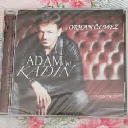 Orhan ölmez adam ve kadın CD ambalajında sıfır