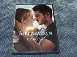 AŞKI ARARKEN-THE LUCKY ONE.SIFIR AYARINDA ÇOK TEMİZ PROBLEMSİZ DVD FİLMDİR.