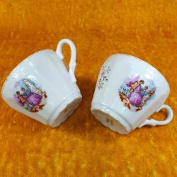 ANTİKA BİR ÇİFT MADE IN JAPAN FRAGONARD RESİMLİ PORSELEN FİNCAN , TABAKLARI YOK