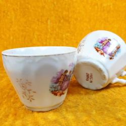 ANTİKA BİR ÇİFT MADE IN JAPAN FRAGONARD RESİMLİ PORSELEN FİNCAN , TABAKLARI YOK