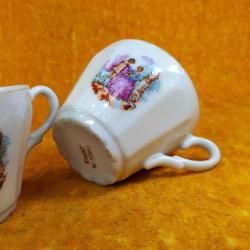 ANTİKA BİR ÇİFT MADE IN JAPAN FRAGONARD RESİMLİ PORSELEN FİNCAN , TABAKLARI YOK