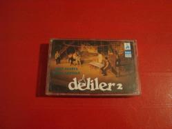 ZEKİ ALASYA METİN AKPINAR*DELİLER 2-KAĞIT BASKI KASET