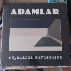 Adamlar rüyalarda buruşmuşuz lp plak ambalajında