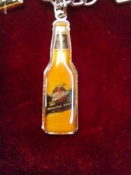 ANAHTARLIK ÜNLÜ MİLLER İÇECEK MARKASININ HER BİRİ AYNI ANAHTARLIK ÜZERİNDE(4 PARÇA) ÇOK ENDER ANAHTARLIĞI  312