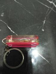 Çok nadir içinde Gerçek , dondurulmuş akrep  bulunan el yapımı anahtarlık.Alt kısmında Afganistan yazılı .