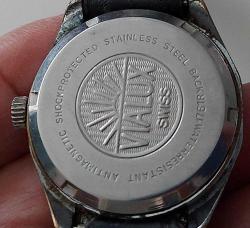 İSVİÇRE VIALUX SÜPER MARKA ANTİK KURMALI BAKIMLI MUHTEŞEM ORİJİNAL UNİSEX SÜPER TAKVİMLİ KRİSTAL CAMLI KOL SAATİ VVV2İİ1