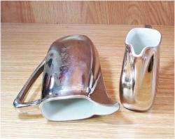 ViNTaGe POLONYA MaLı GÜMÜŞ KaPLaMaLI PORSELEN SÜTLÜKLER....2 Adet