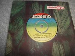 56 - YÜKSEL ÖZKASAP - Seher vakti evinizden - Beyaz atlı