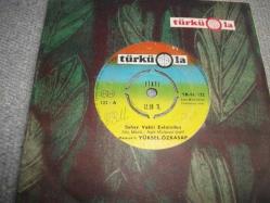 56 - YÜKSEL ÖZKASAP - Seher vakti evinizden - Beyaz atlı