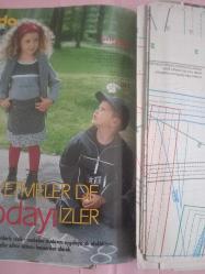 Burda Kadın Moda Dergi Ağustos 1999 şık ve spor kıyafetler,elbiseler kruvaze ceketler,pantolonlar bluzlar ,çocuk kıyafetleri  patronları ve anlatımı içindedir